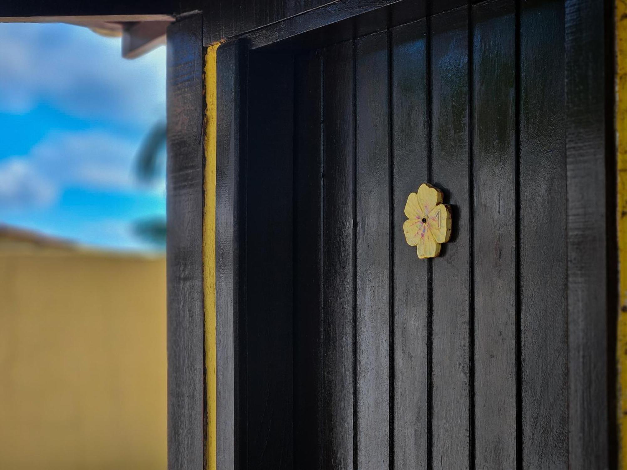 Bella Vista Ocean View Hotel Búzios Екстериор снимка A golden flower-shaped knob on a door