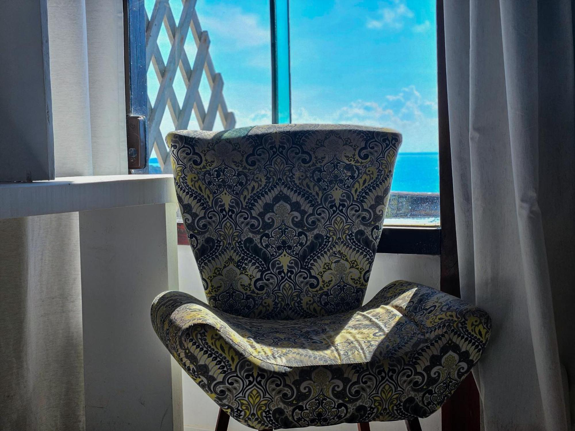 Bella Vista Ocean View Hotel Búzios Екстериор снимка A chair in a hotel room